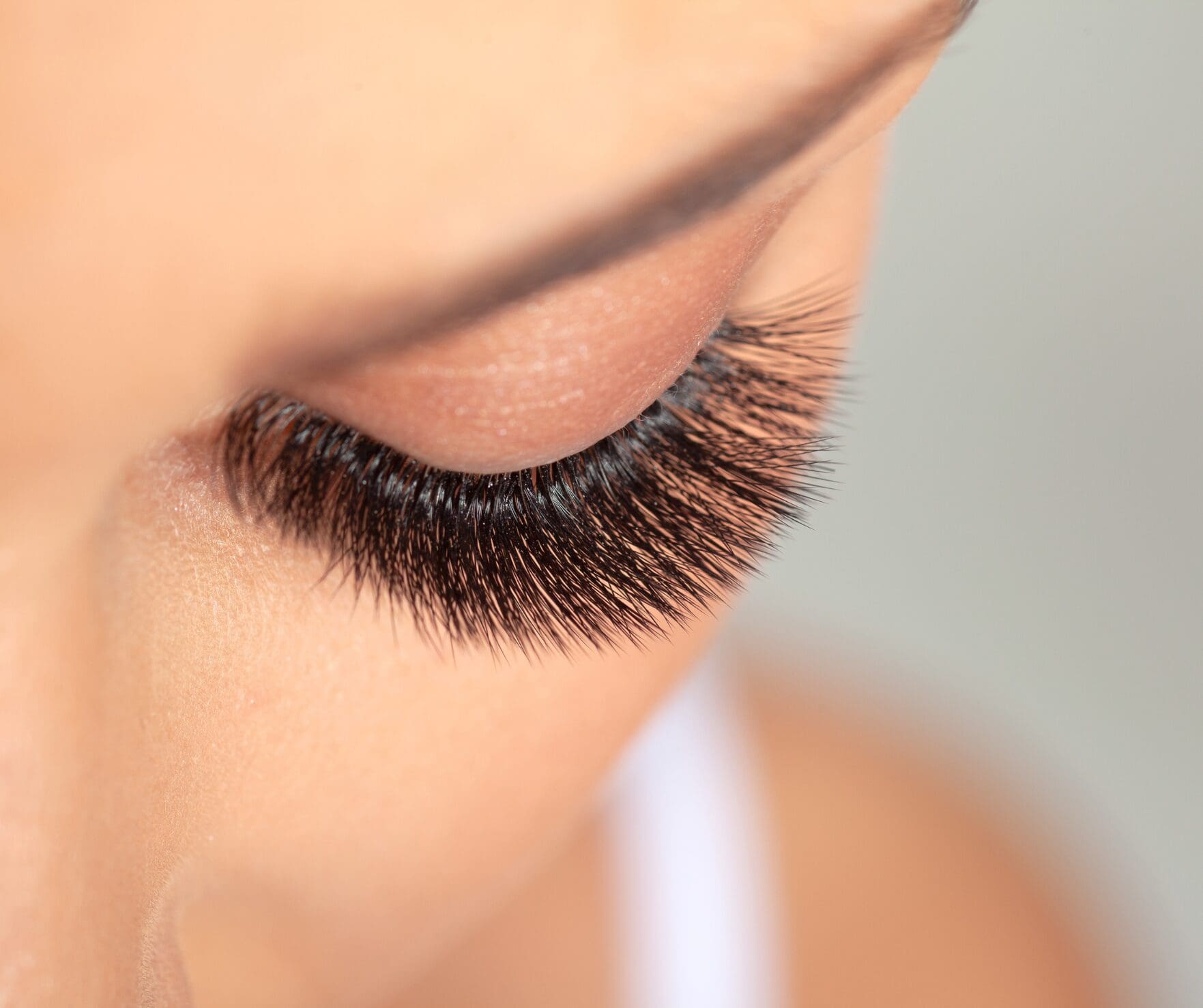 A woman wearing a set of false lashes